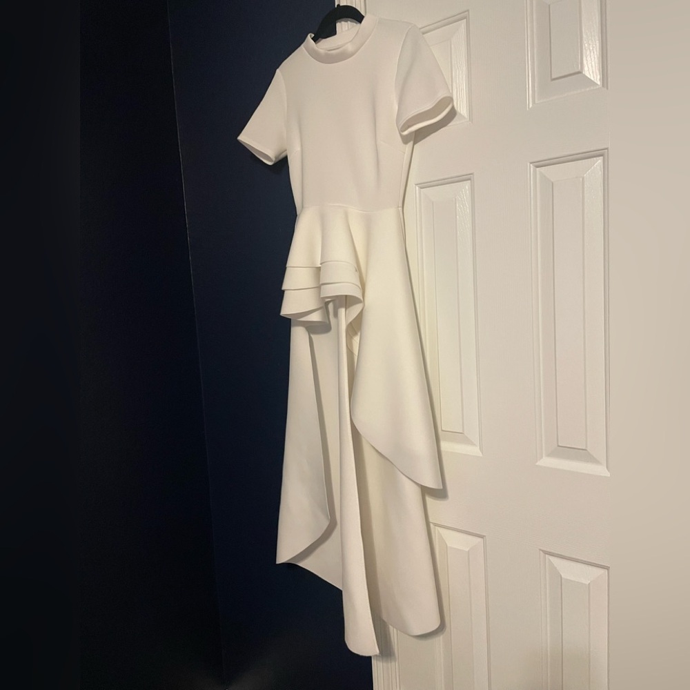 Elegant White Peplum Top